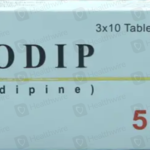 Amodip 5mg Amlodipine tablets packaging box for hypertension and angina treatment.