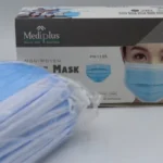 A stack of blue 3-ply disposable face masks with comfortable ear loops.